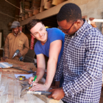 Two men working on a community project