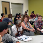 Classroom full of people.