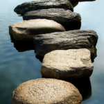 A rock path over water