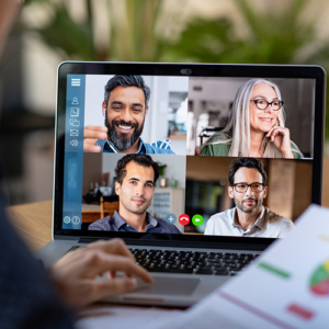 Four individuals appear to be on a video call with one another